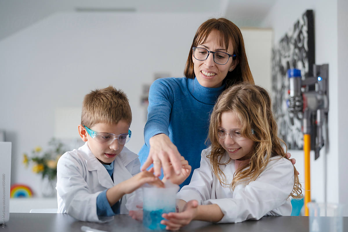 Mother and children experimenting with chemicals