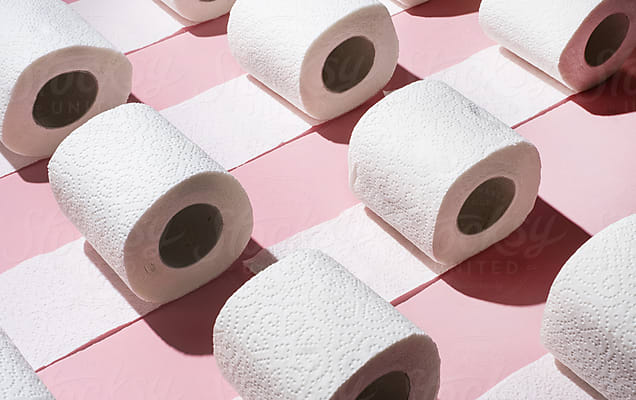 Toilet Paper Rolls On Pink Background. by Stocksy Contributor AUDSHULE -  Stocksy