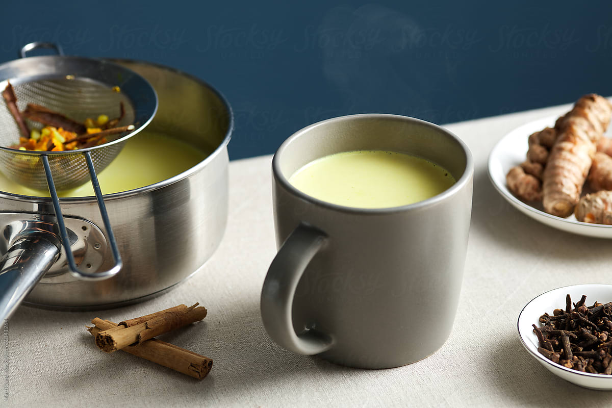 Hot fresh Golden milk in mug.