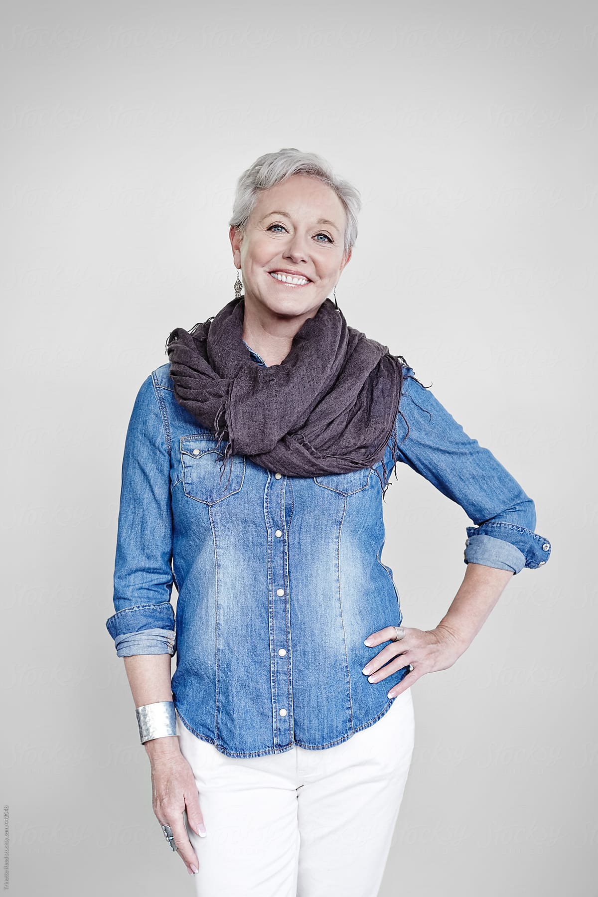 Portrait of confident mature woman with grey hair
