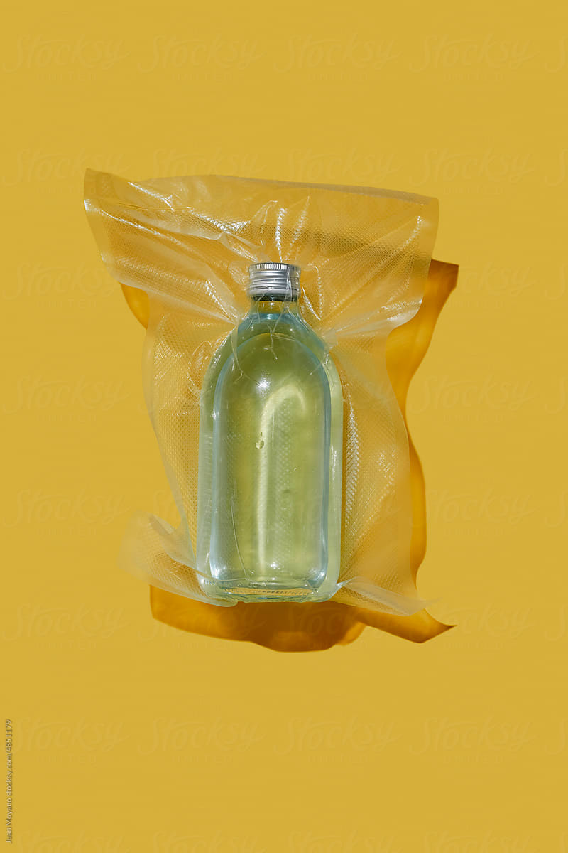 bottle with water in a vacuum bag