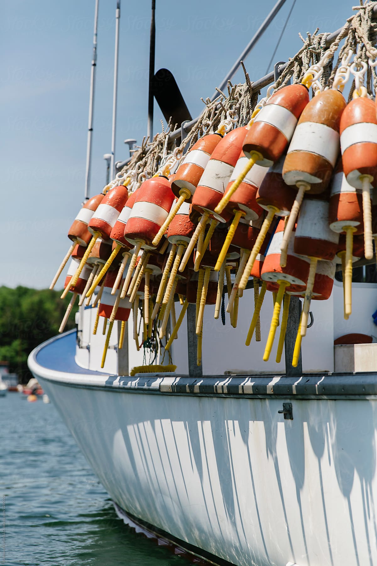Lobster Buoys On Fishing Boat by Stocksy Contributor Raymond Forbes LLC  - Stocksy