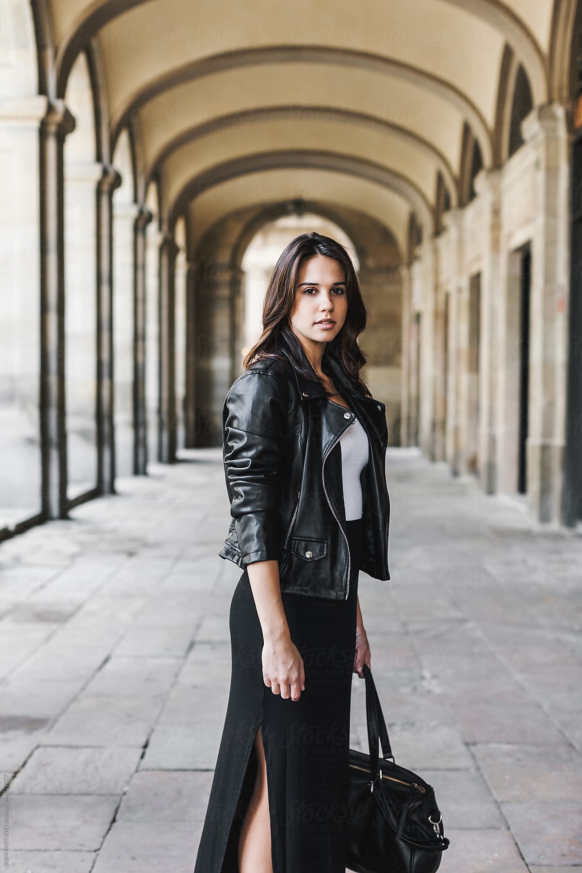 City life woman wearing leather jacket.