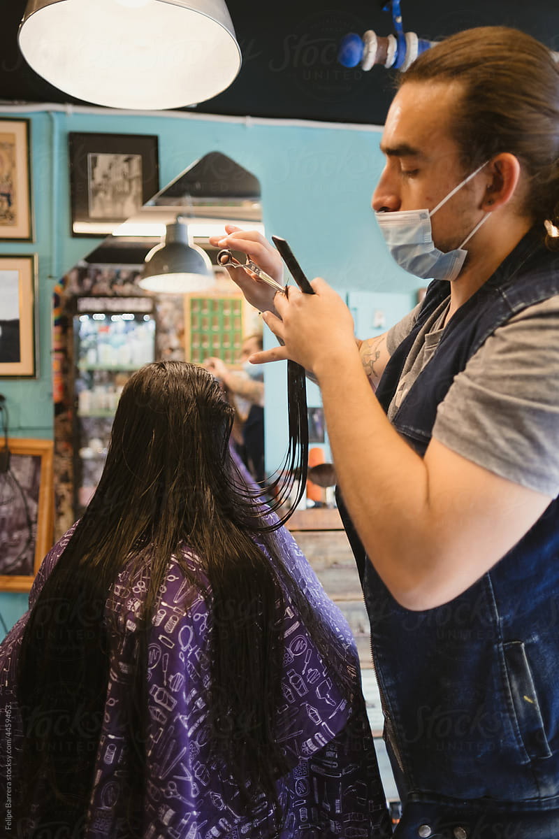 Girl getting a haircut in a hair salon