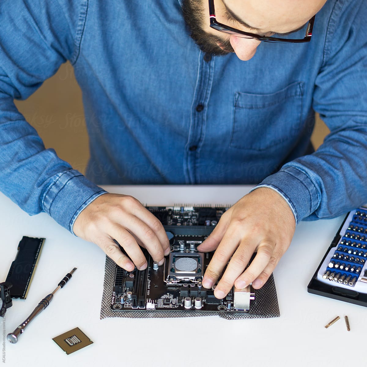 Technician fixing computer