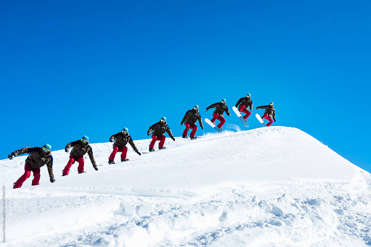 Sequence photo of a snowboarder jumping