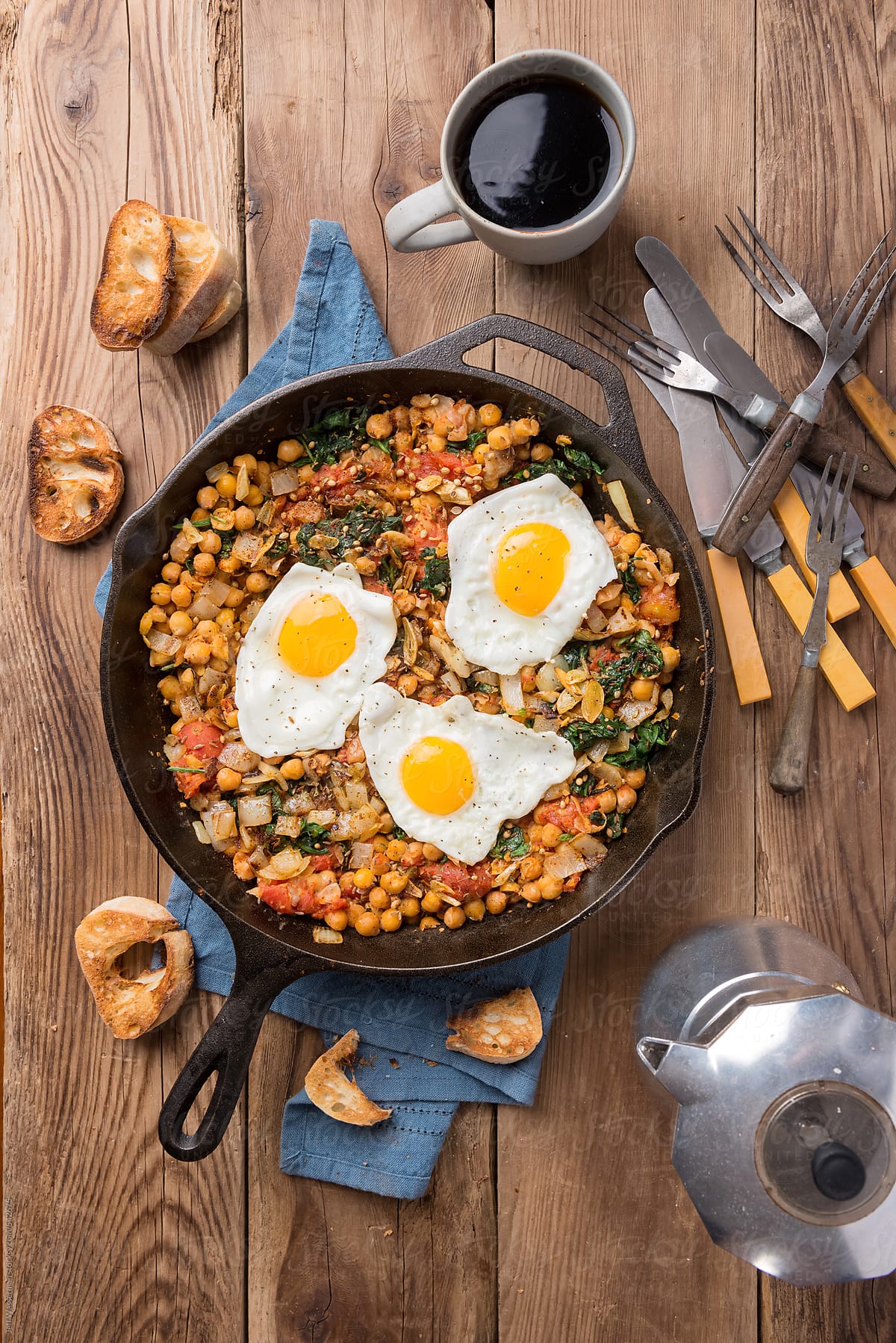 Spinach With Chickpeas And Fried Eggs