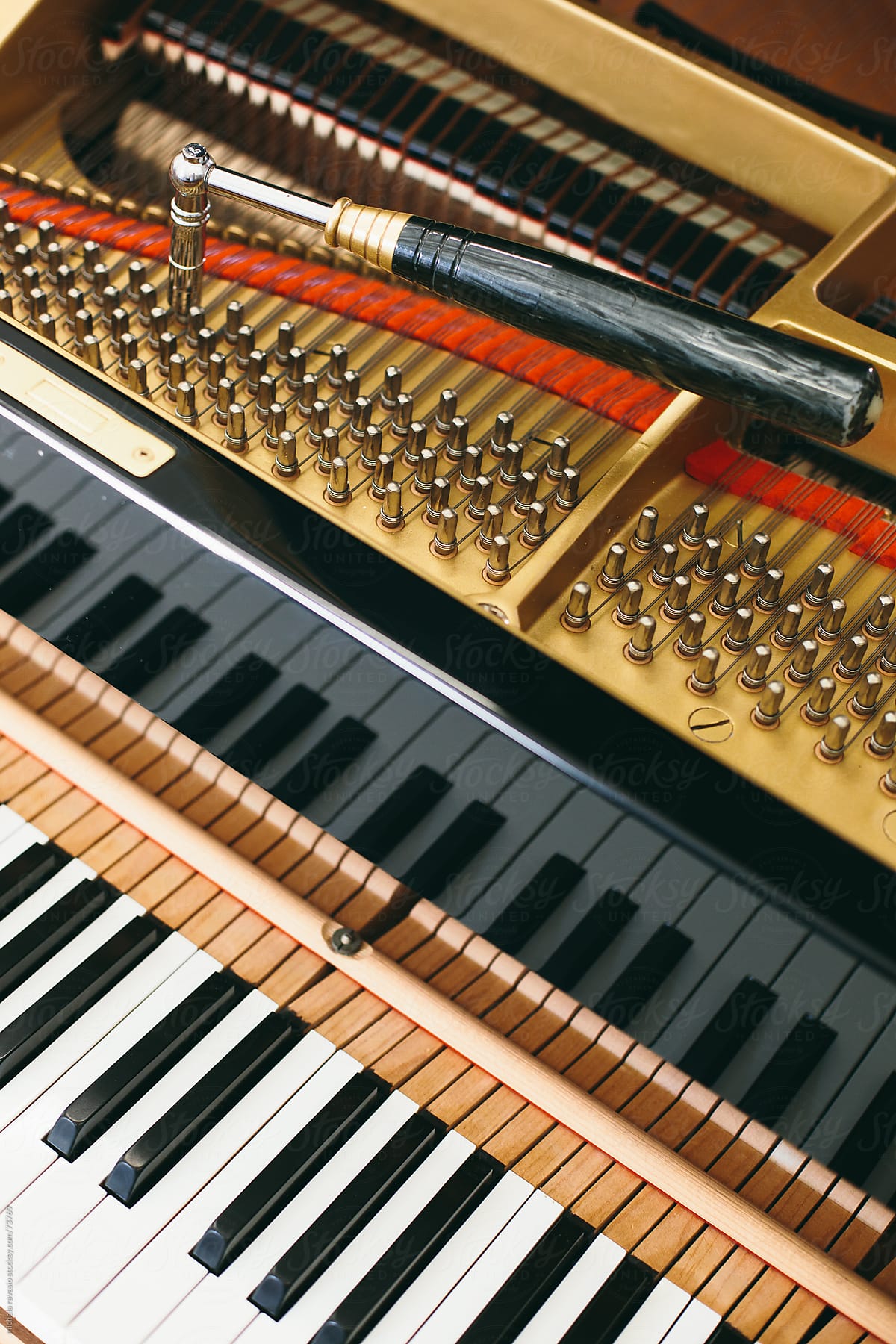 Keyboard and mechanics of a piano