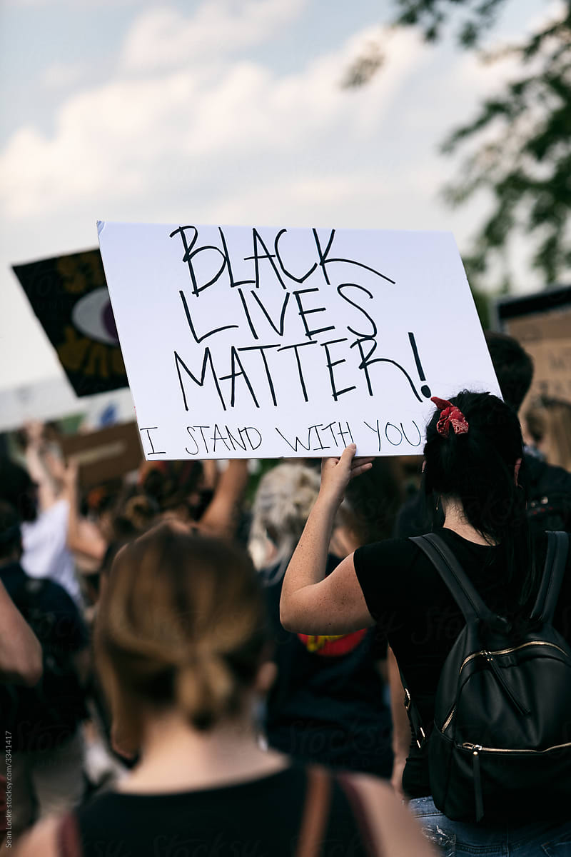 BLM: Caucasian Protester Holds Black Lives Matter Sign