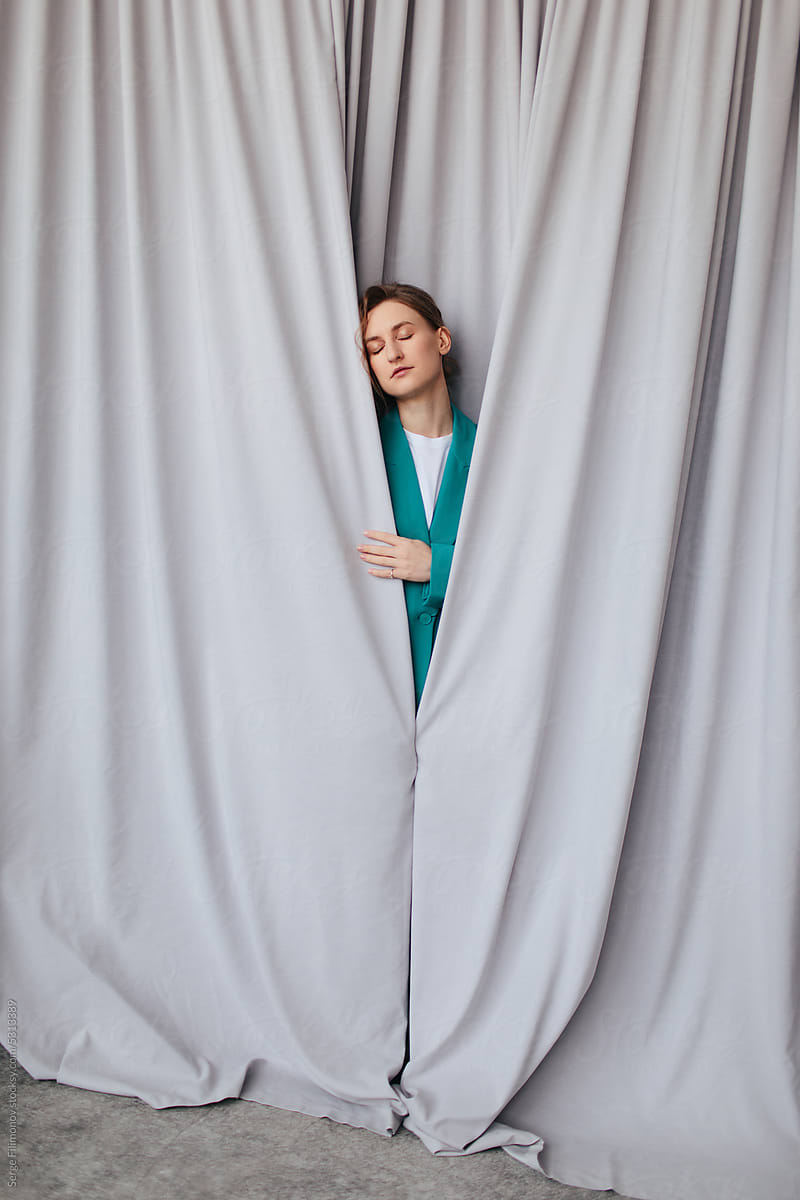 Woman behind curtain - Fashion portrait