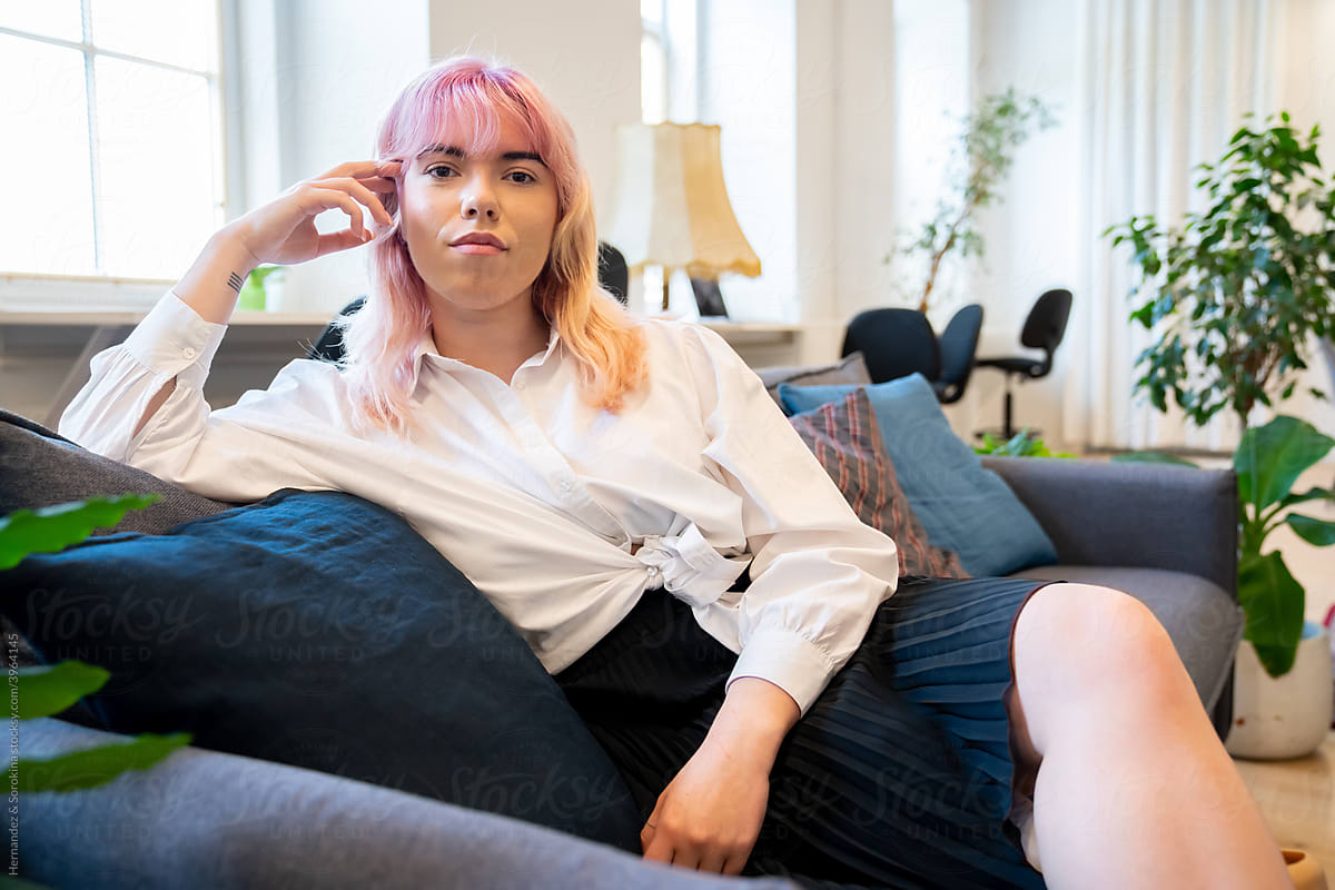 Portrait Of Stylish Woman Siting On The Couch