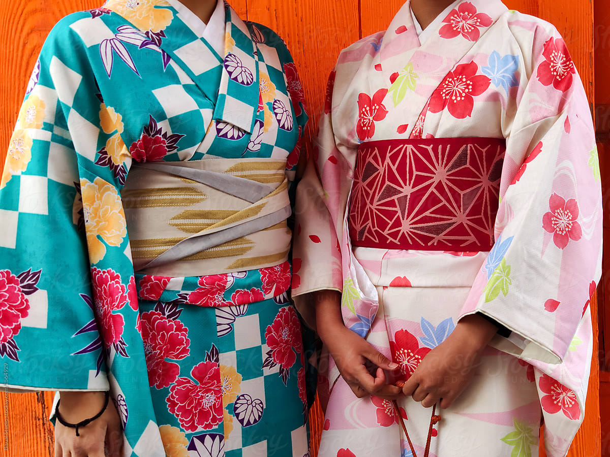 Two woman wearing a kimono