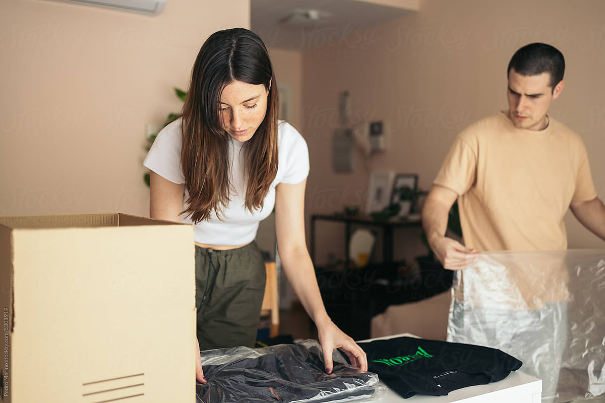 Couple Packing Delivery Online Purchase Of Clothing