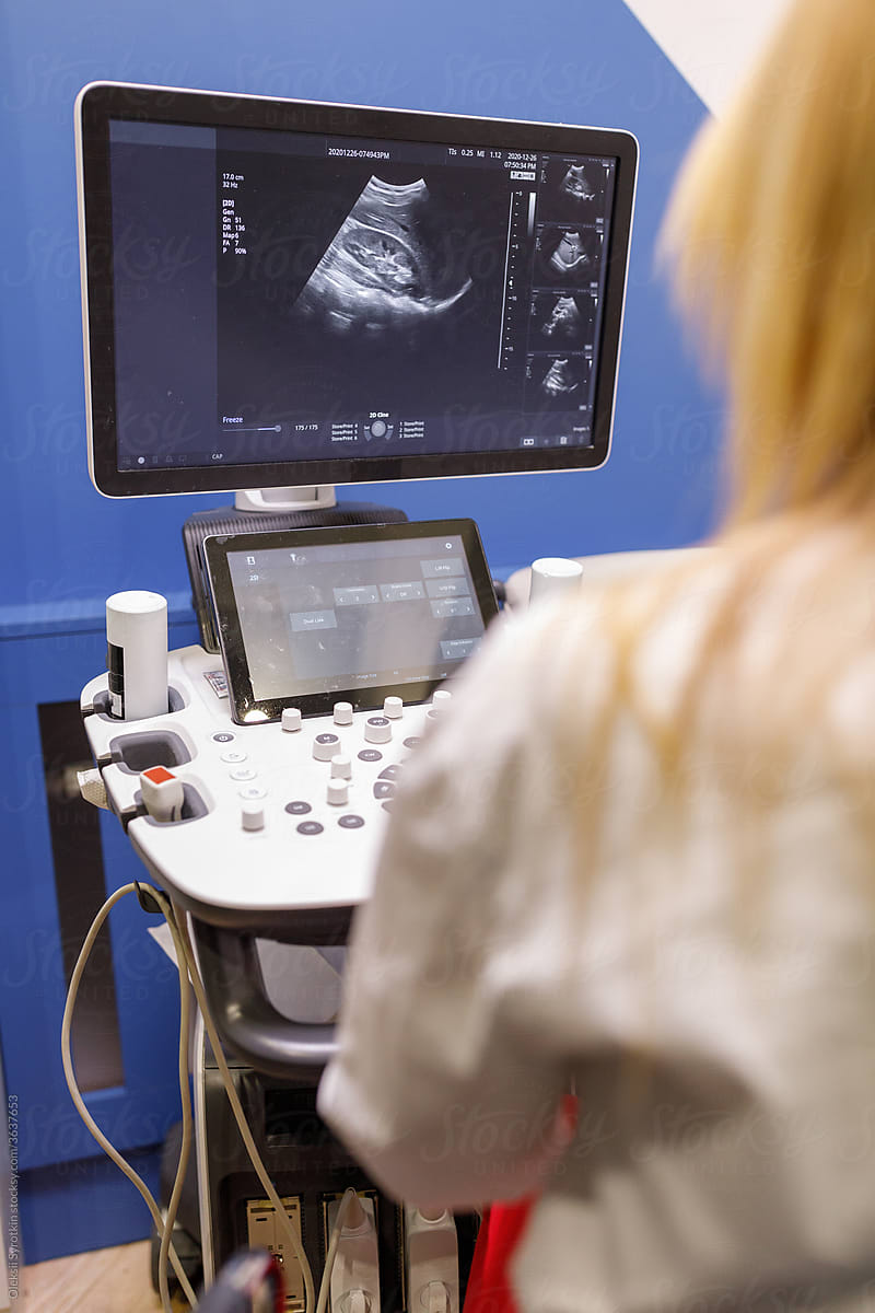 Doctor performing ultrasonography diagnostics