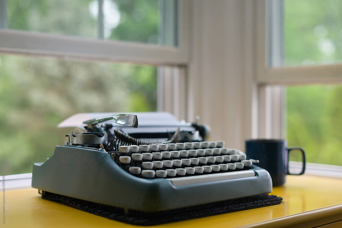 Typewriter sitting on desk