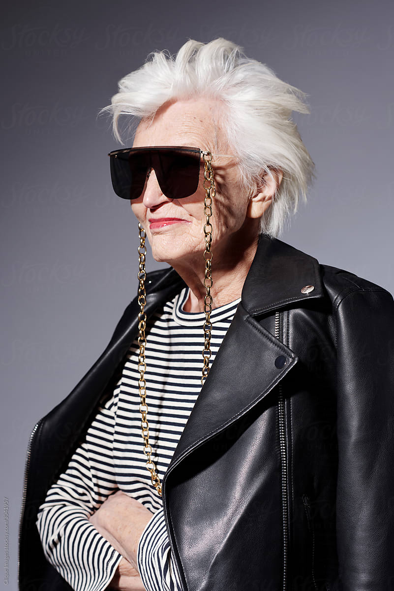 Positive Aged Woman In Leather Jacket