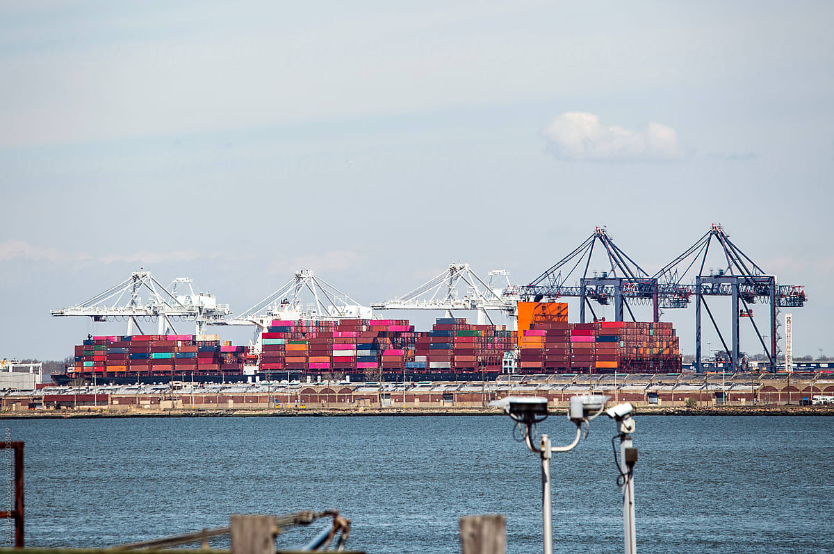 Manhattan port with colorful shipping containers and cranes