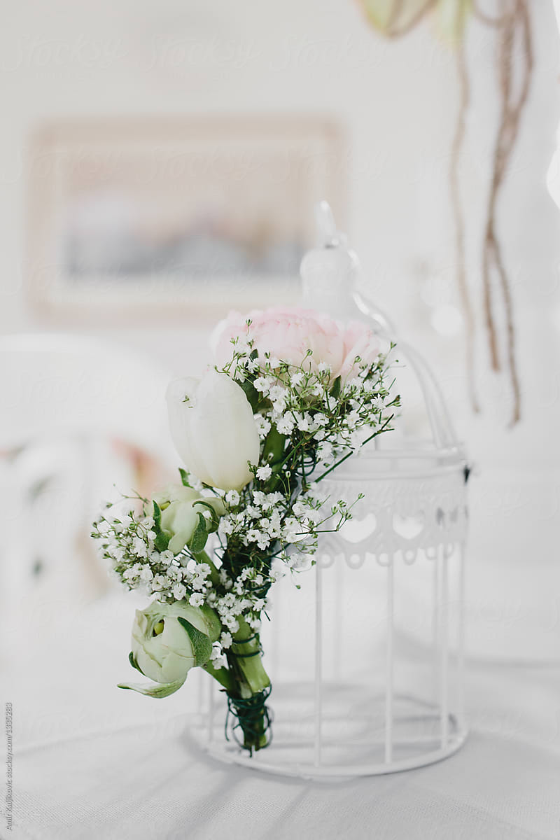 Delicate posy of baby breath and roses