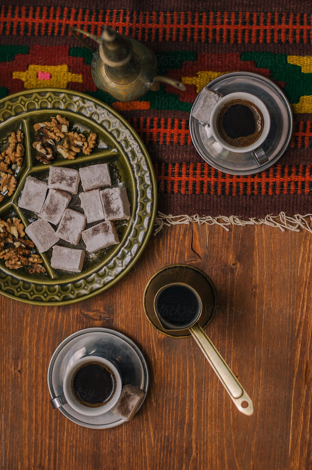 Oriental black coffee and turkish delight with walnuts