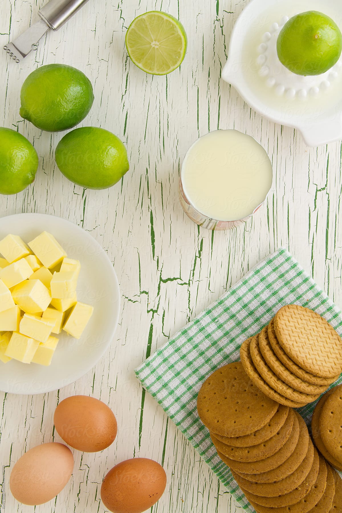 Key Lime Pie Ingredients laid out, viewed from above