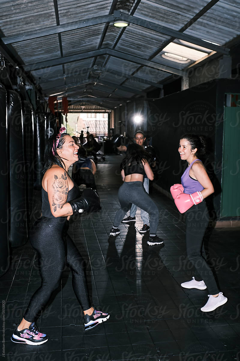 Friends enjoying a boxing training session