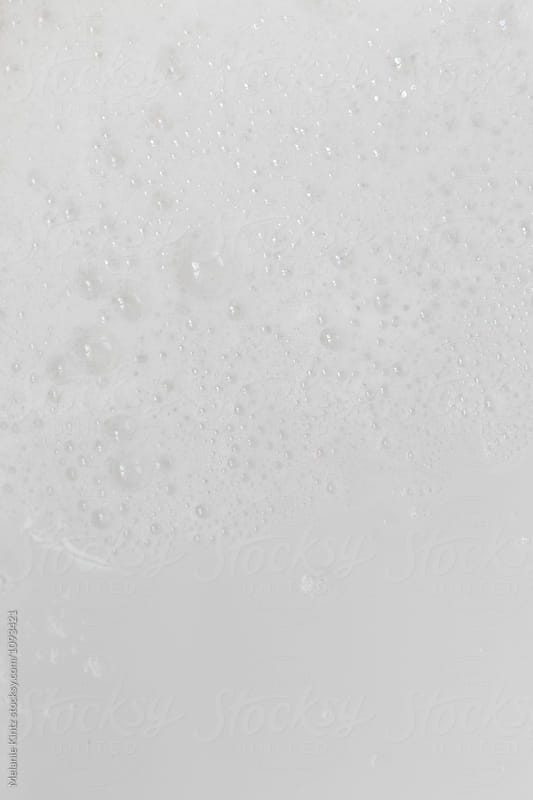 Foam on the bottom of a bathtub