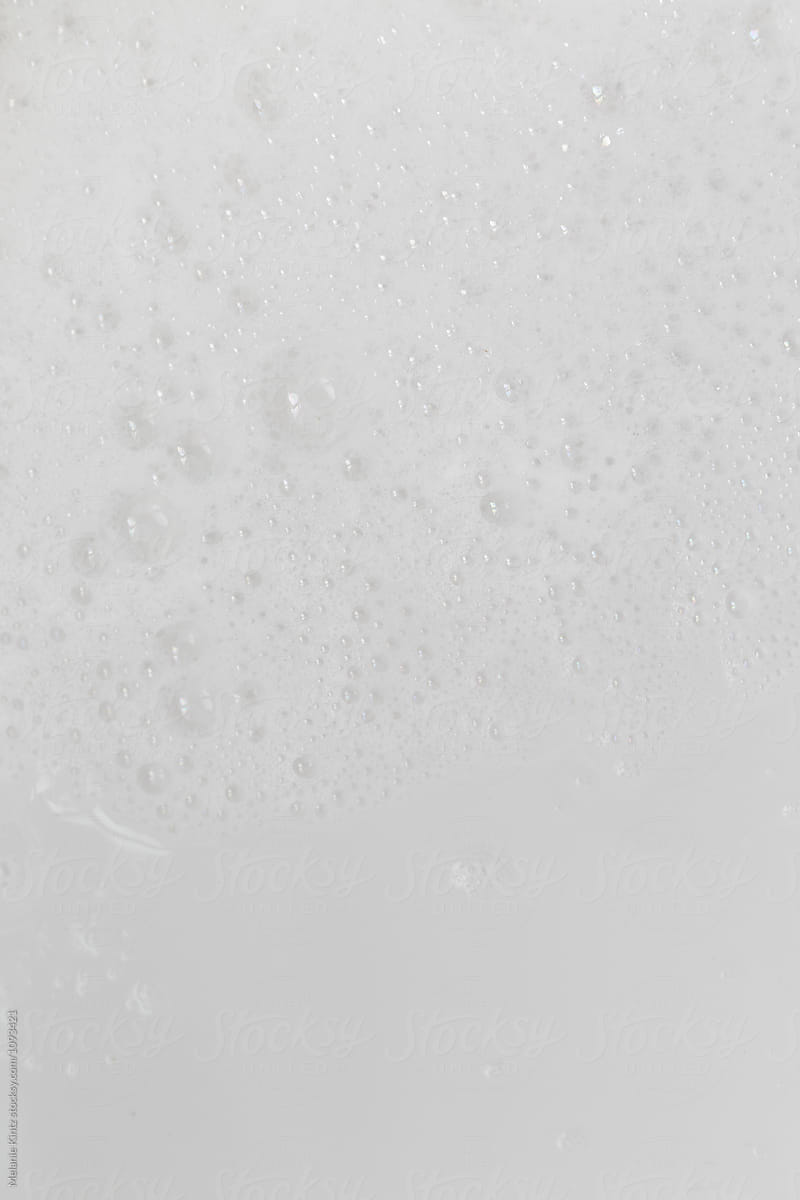 Foam on the bottom of a bathtub
