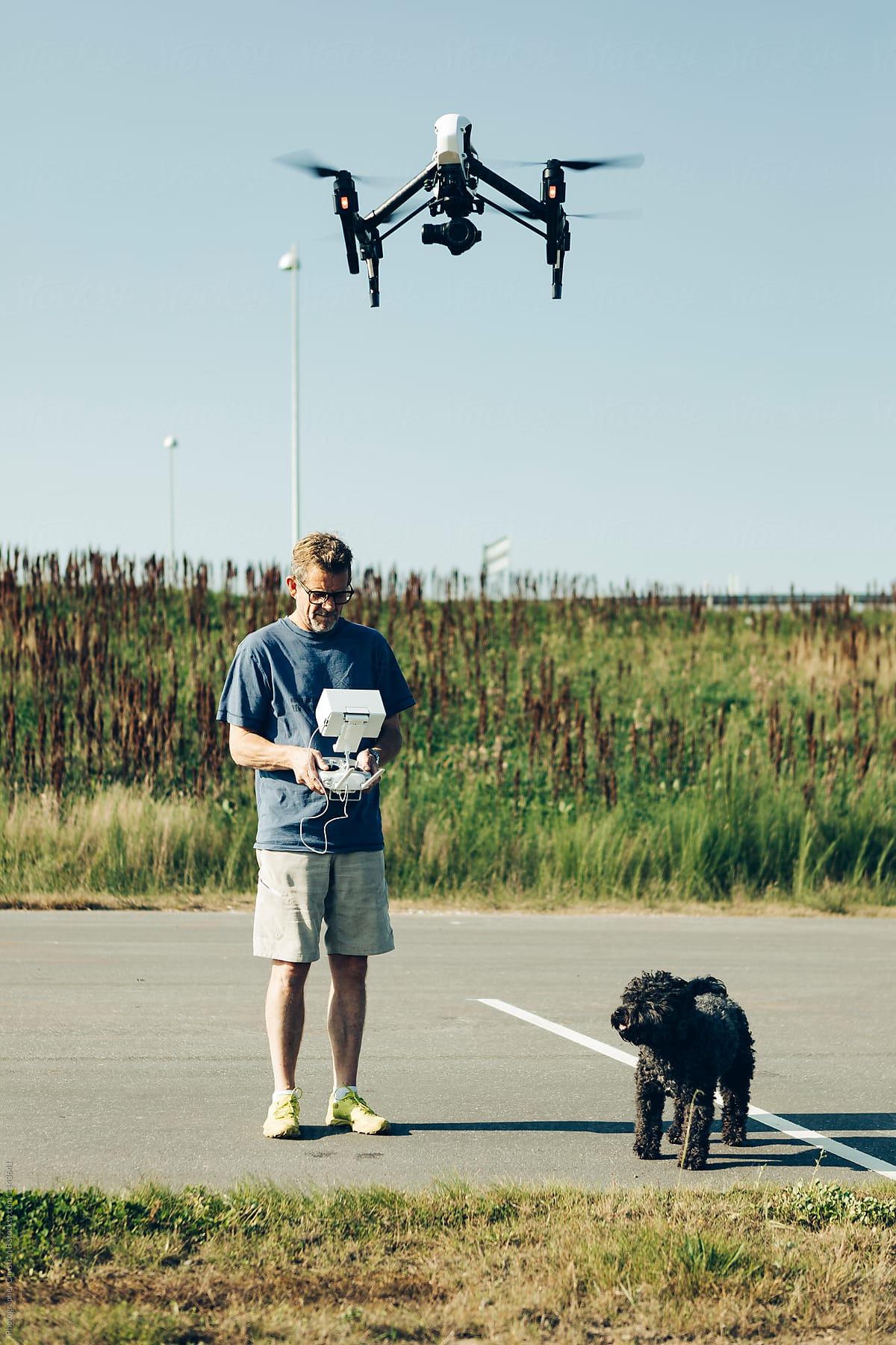 Man, dog, drone