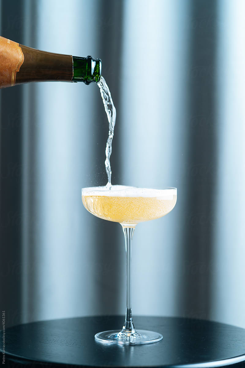 Champagne being pouring into glass