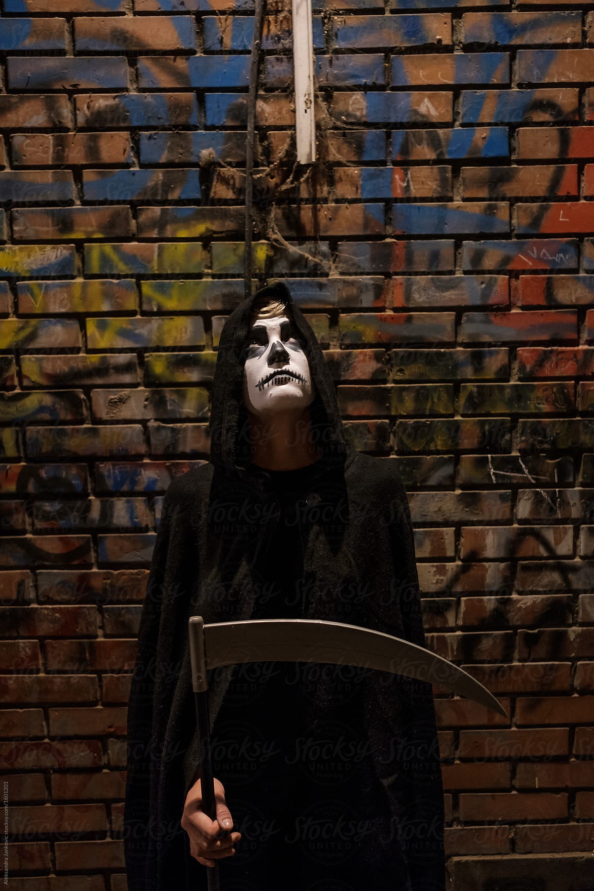 The Grim Reaper Costume For Halloween Del Colaborador De Stocksy