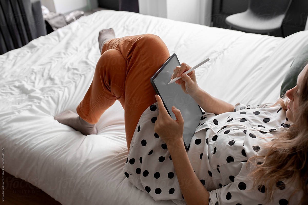 woman working on tablet