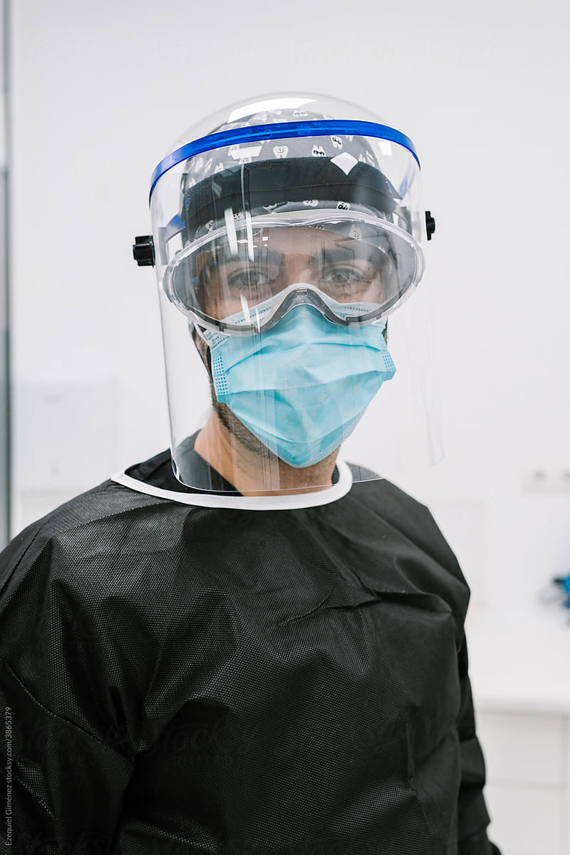 Portrait of a man in pandemic protective clothing.