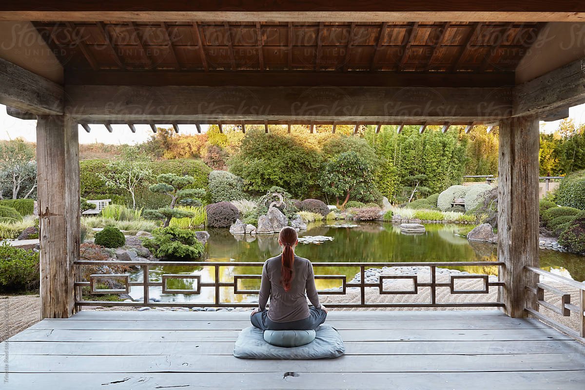 Woman Meditating In Japanese Meditation Garden By Stocksy Contributor Trinette Reed Stocksy
