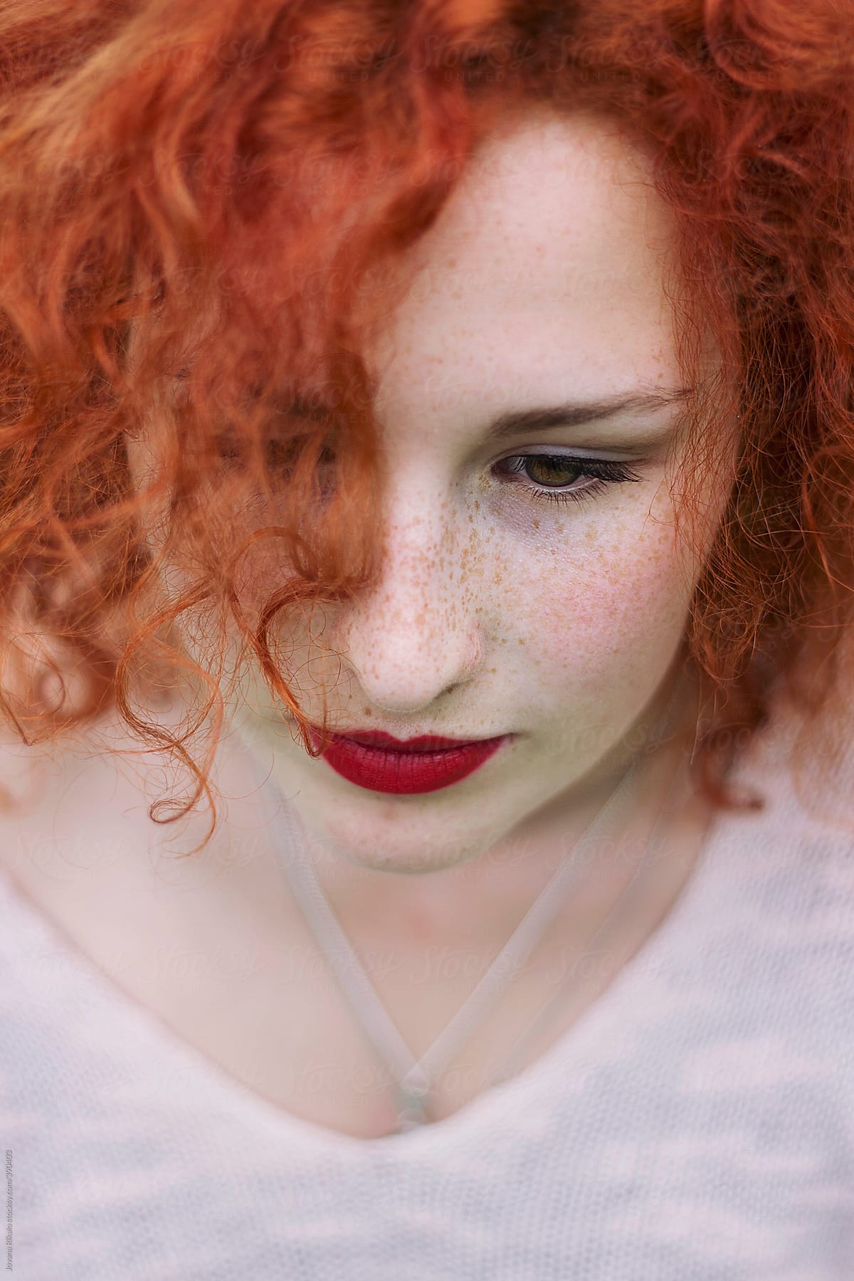 Ginger haired woman with freckles