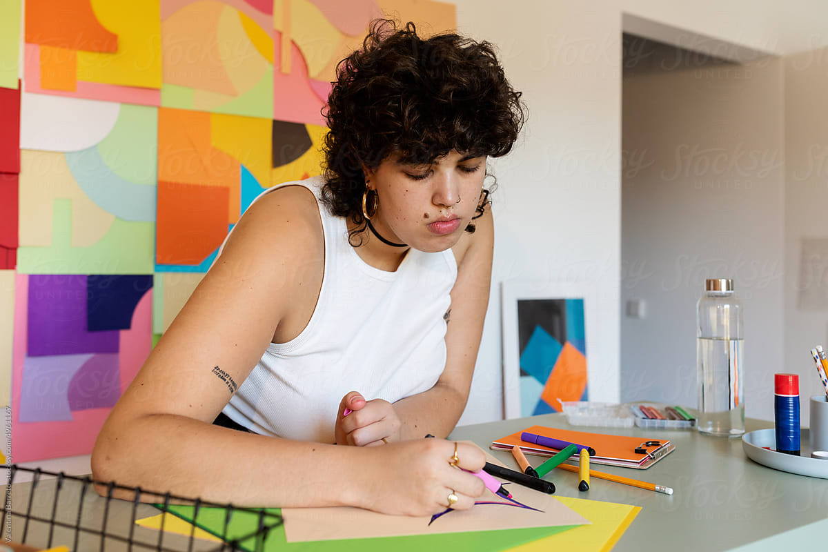 Trans woman drawing in her studio