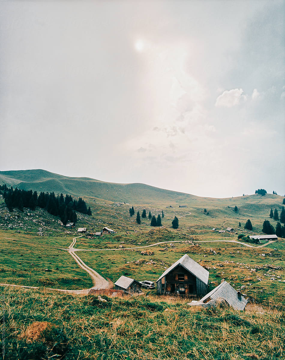 Mountain Cabins on Picturesque Swiss Alp in Midsummer