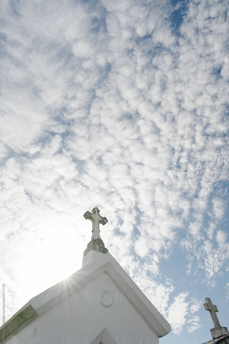 Cross and Sunlight in New Orleans Cemetery