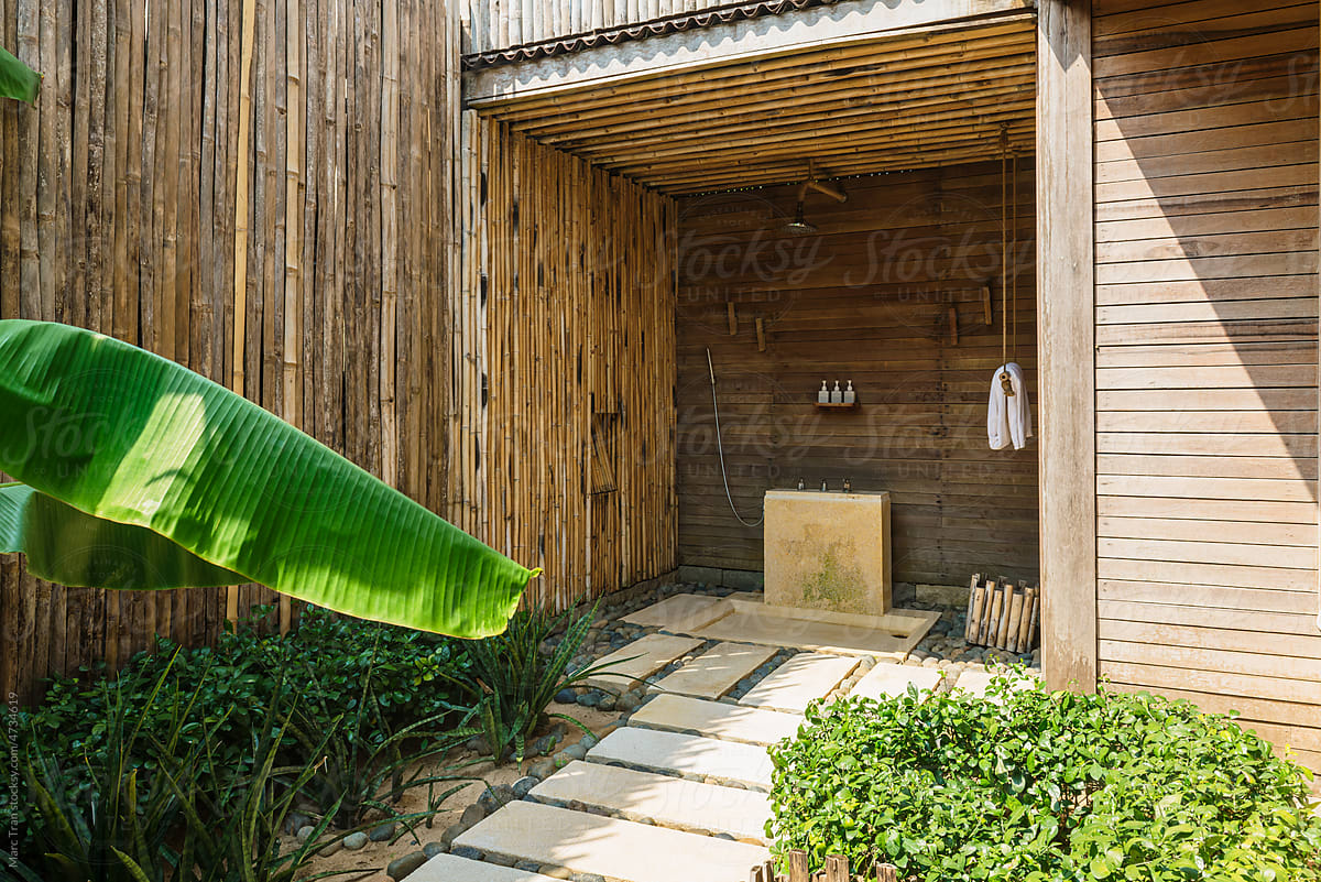 Outdoor rain shower in tropical resort  with wood wall decoration