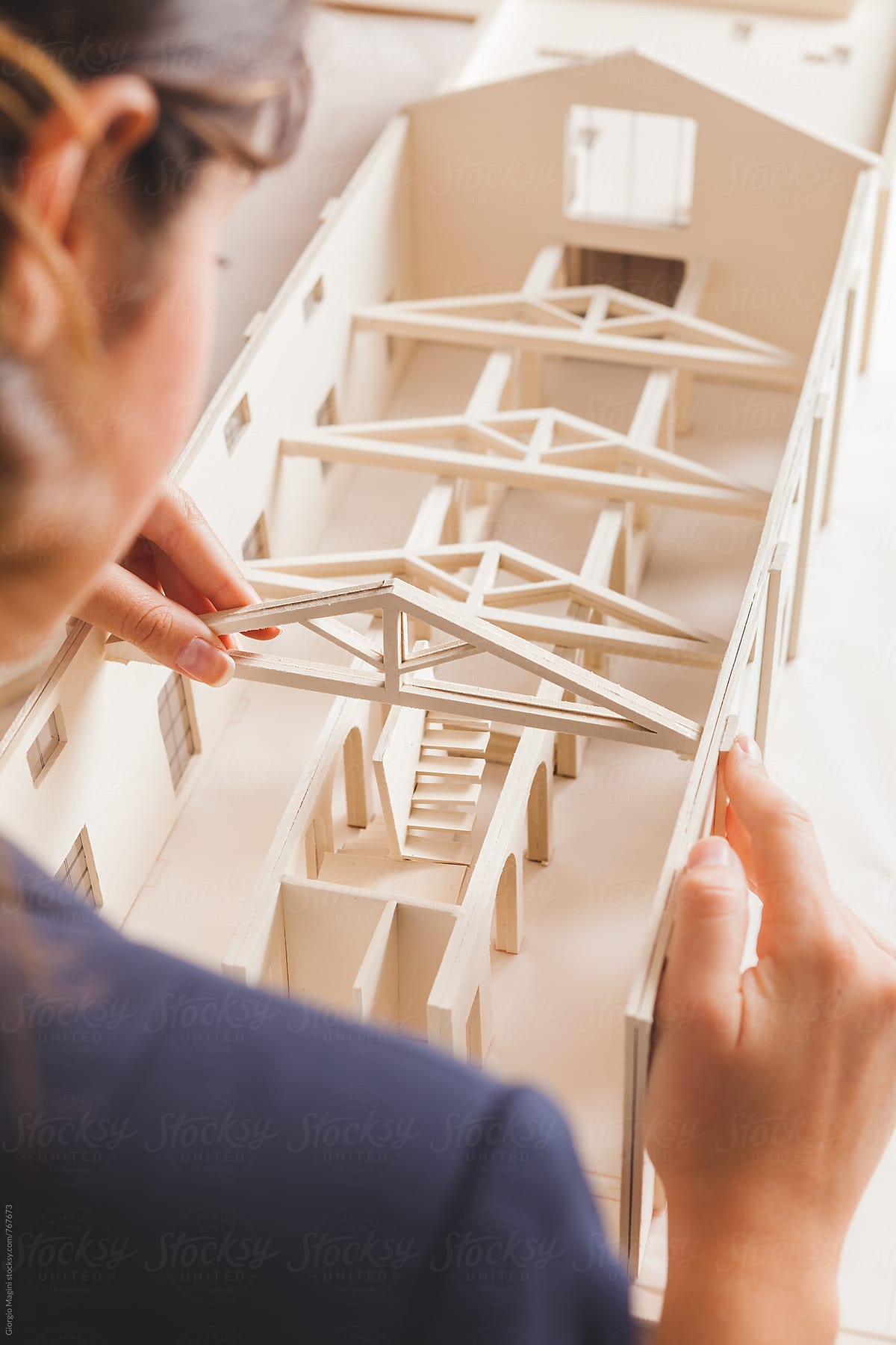 Architect Creating an Housing Model Made of Cardboard