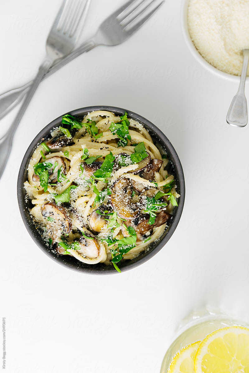 Mushroom, parsley and mascarpone with spaghetti pasta in bowl