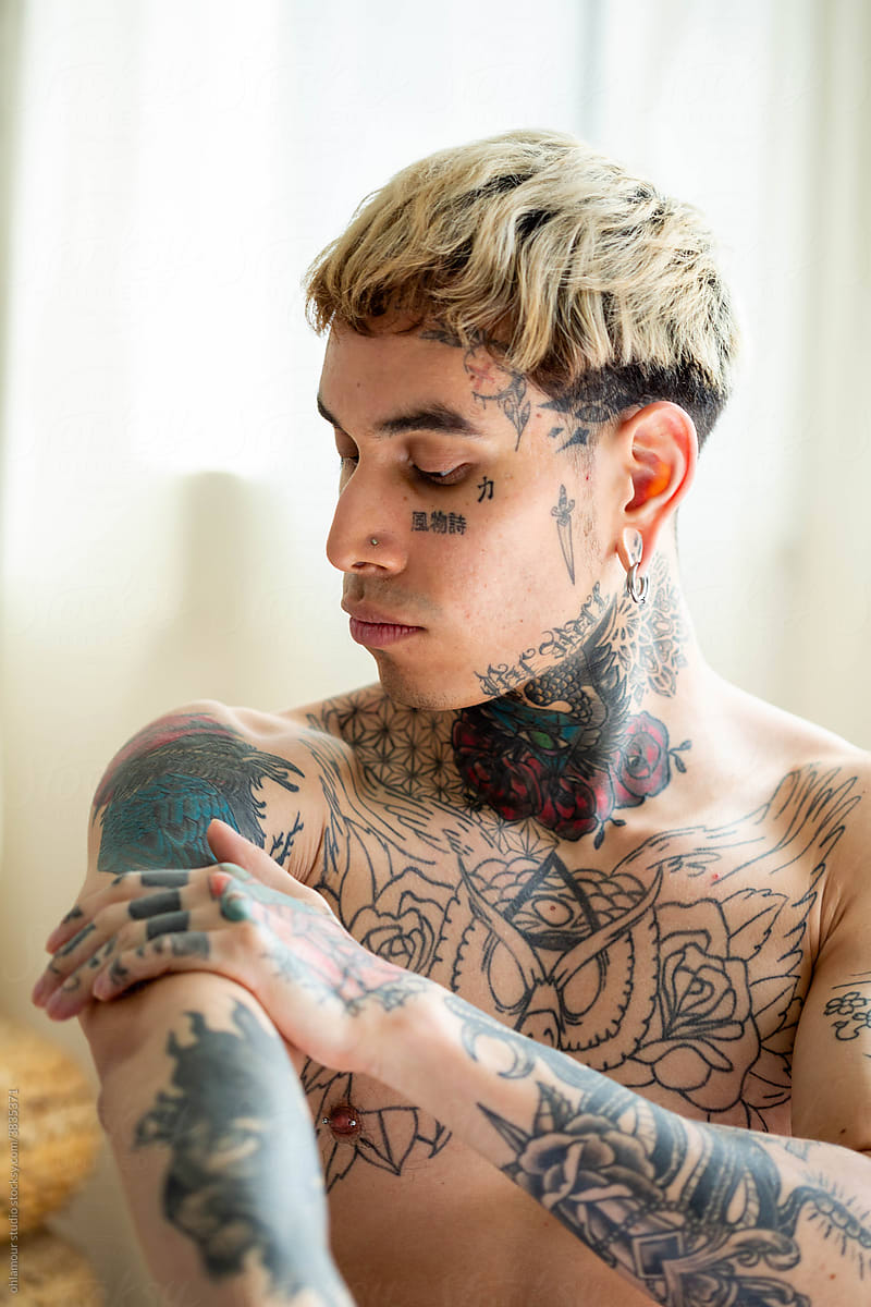 face tattooed man skincare