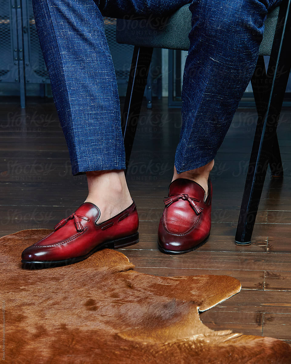 Men in red leather mens shoes on calfskin