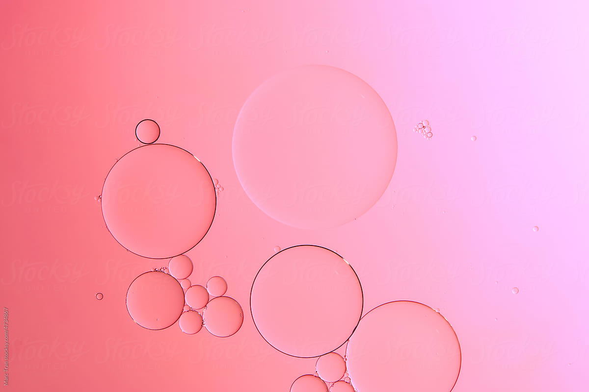 oil with bubbles on coral background