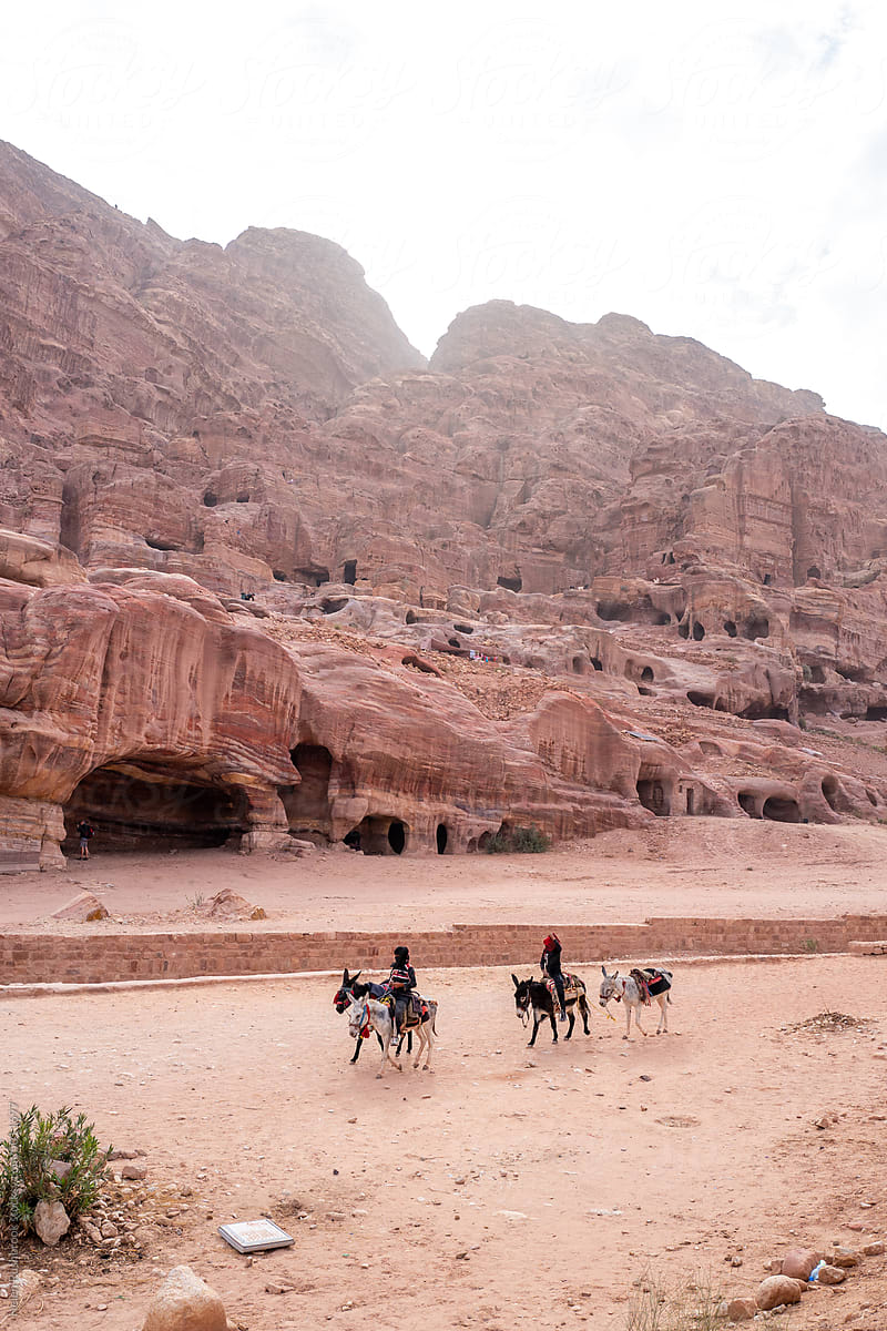 Main street Petra with bedouins on mules