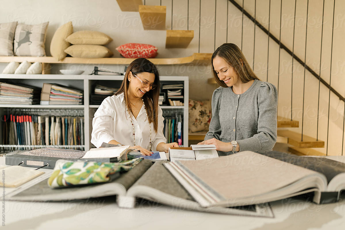Women Choosing Fabric In The Store