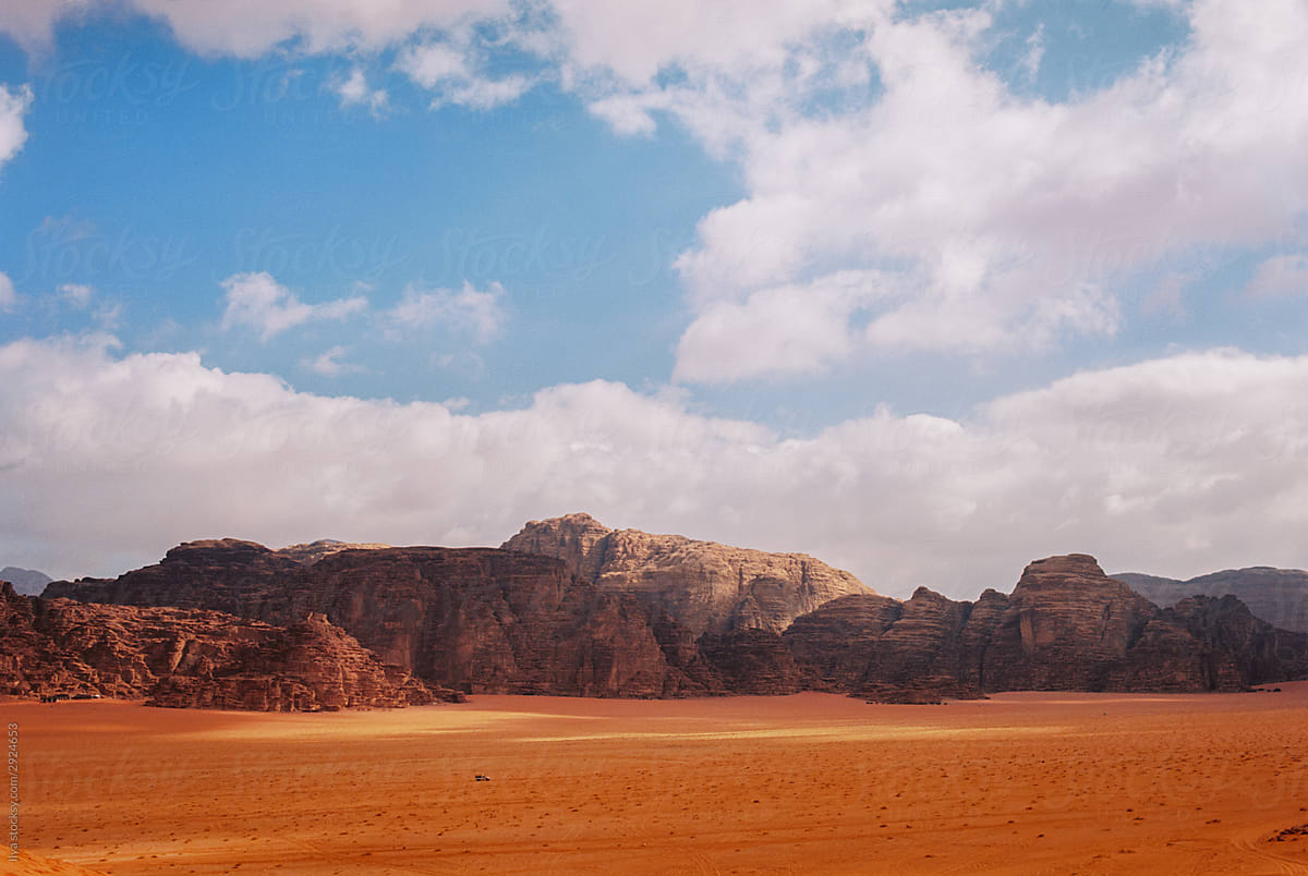 Wadi Rum Jordan desert with distant car