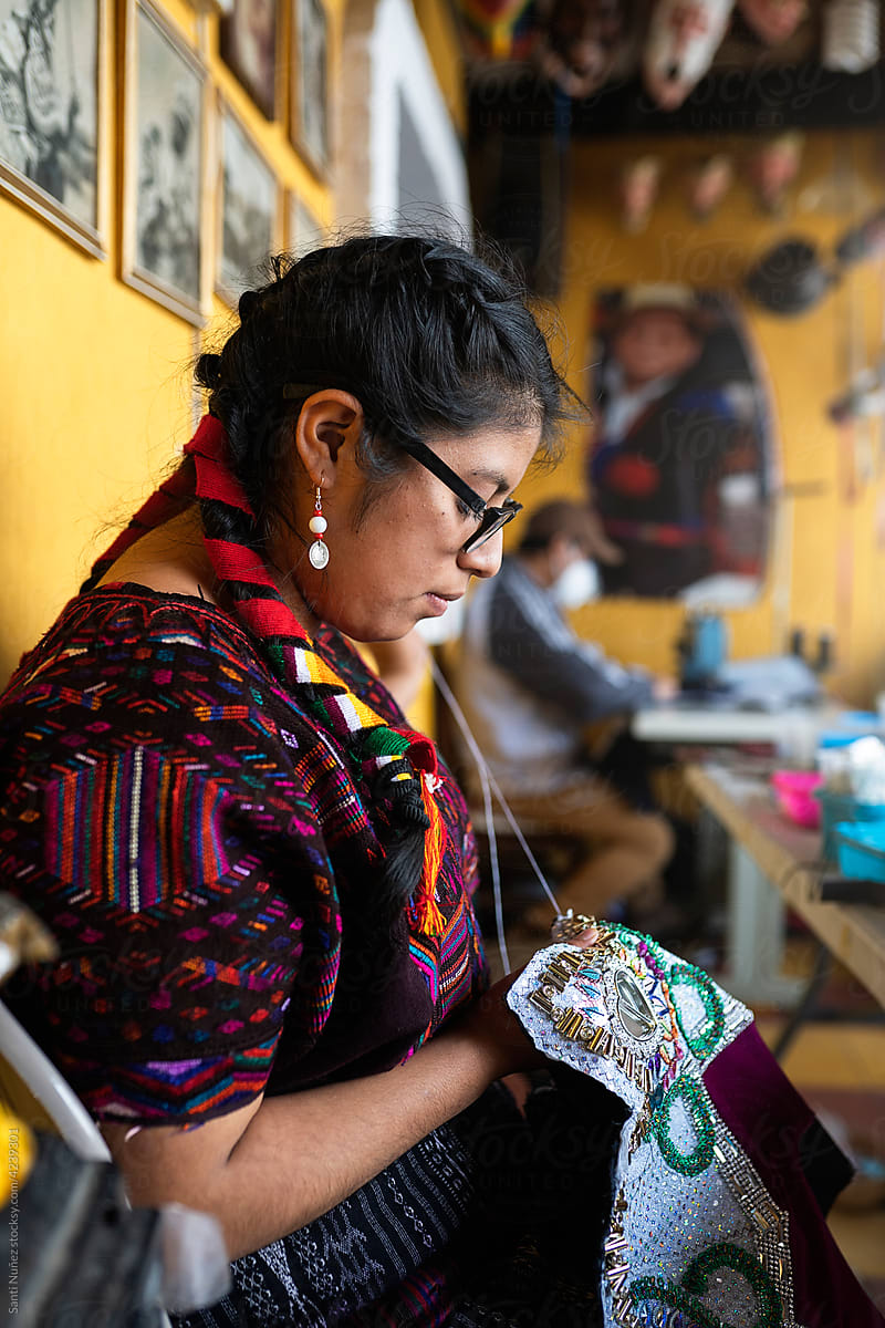 Guatemalan seamstress working in her craft workshop.
