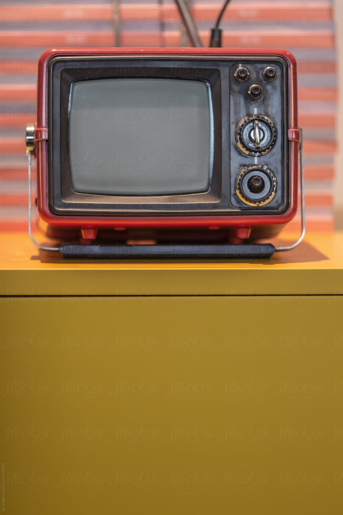old television on modern shelf