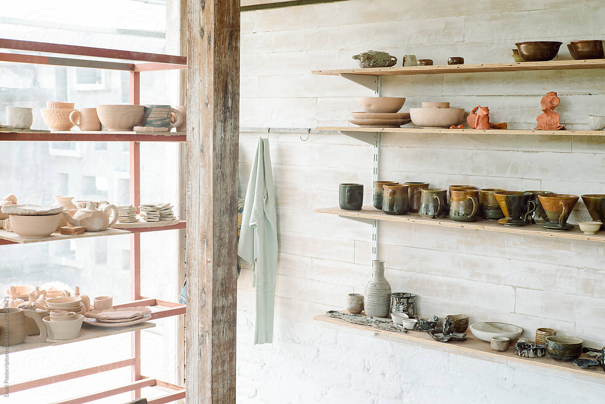 Shelves with finished products in a pottery workshop