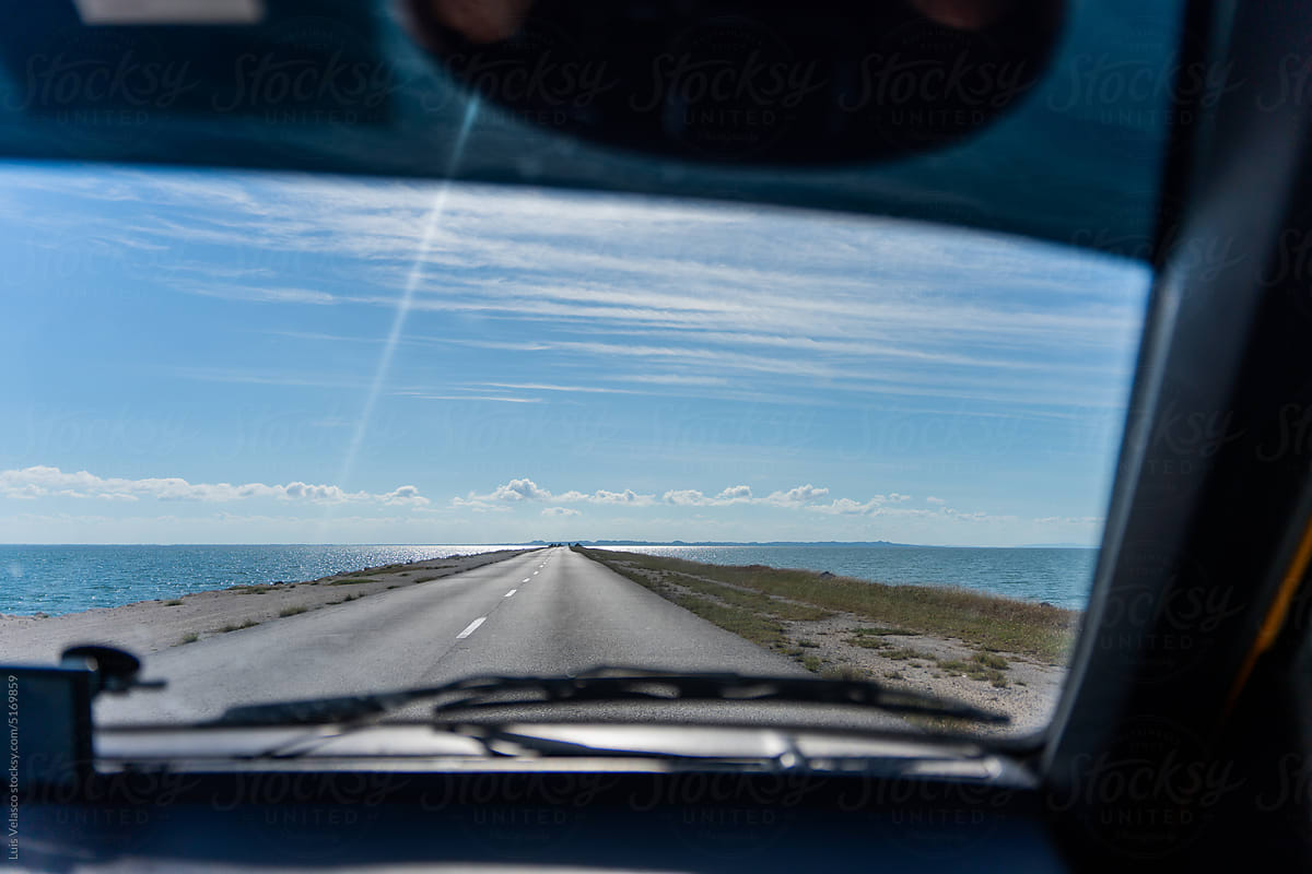 Point Of View From A Car Driving On A Cuban Freeway Near The Sea